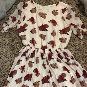 White dress with red roses